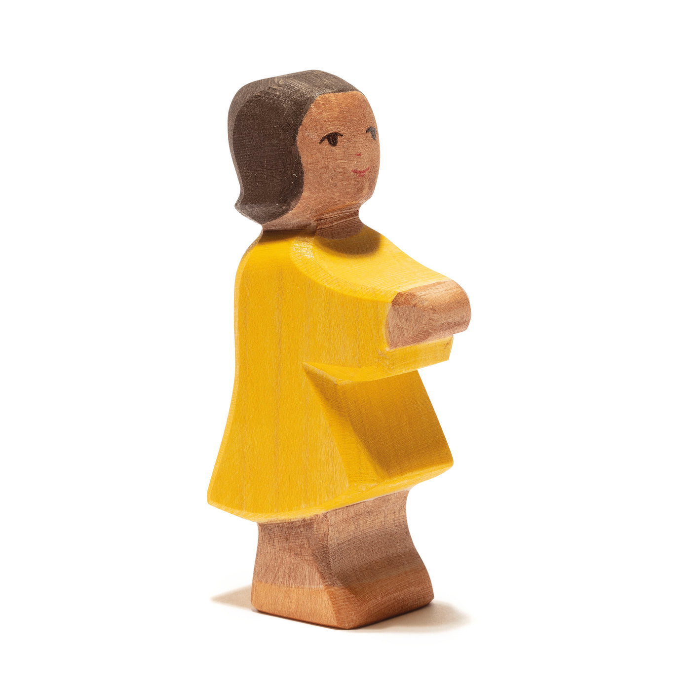 Handcrafted wooden black girl in a yellow dress by Ostheimer, perfect for imaginative play and storytelling