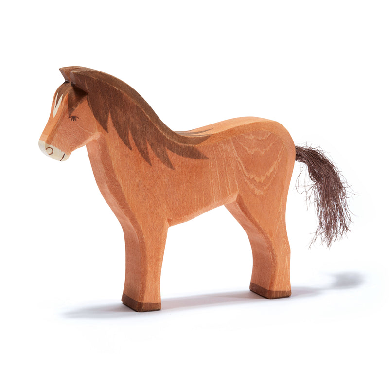 Elegant handcrafted wooden brown horse by Ostheimer, featuring a dark mane and tail, ideal for imaginative play and storytelling