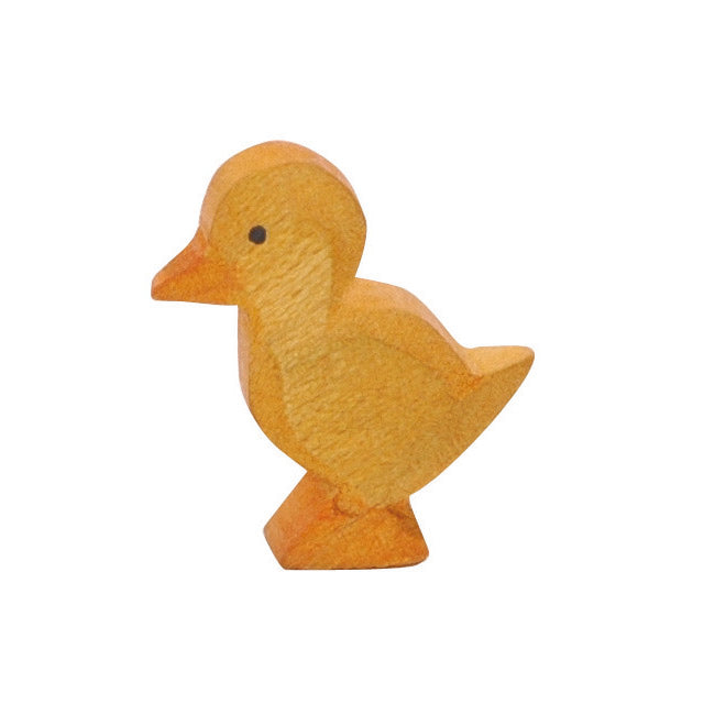 Adorable handcrafted wooden duckling by Ostheimer, symbolizing the bond between young ducks and their parents, perfect for imaginative play