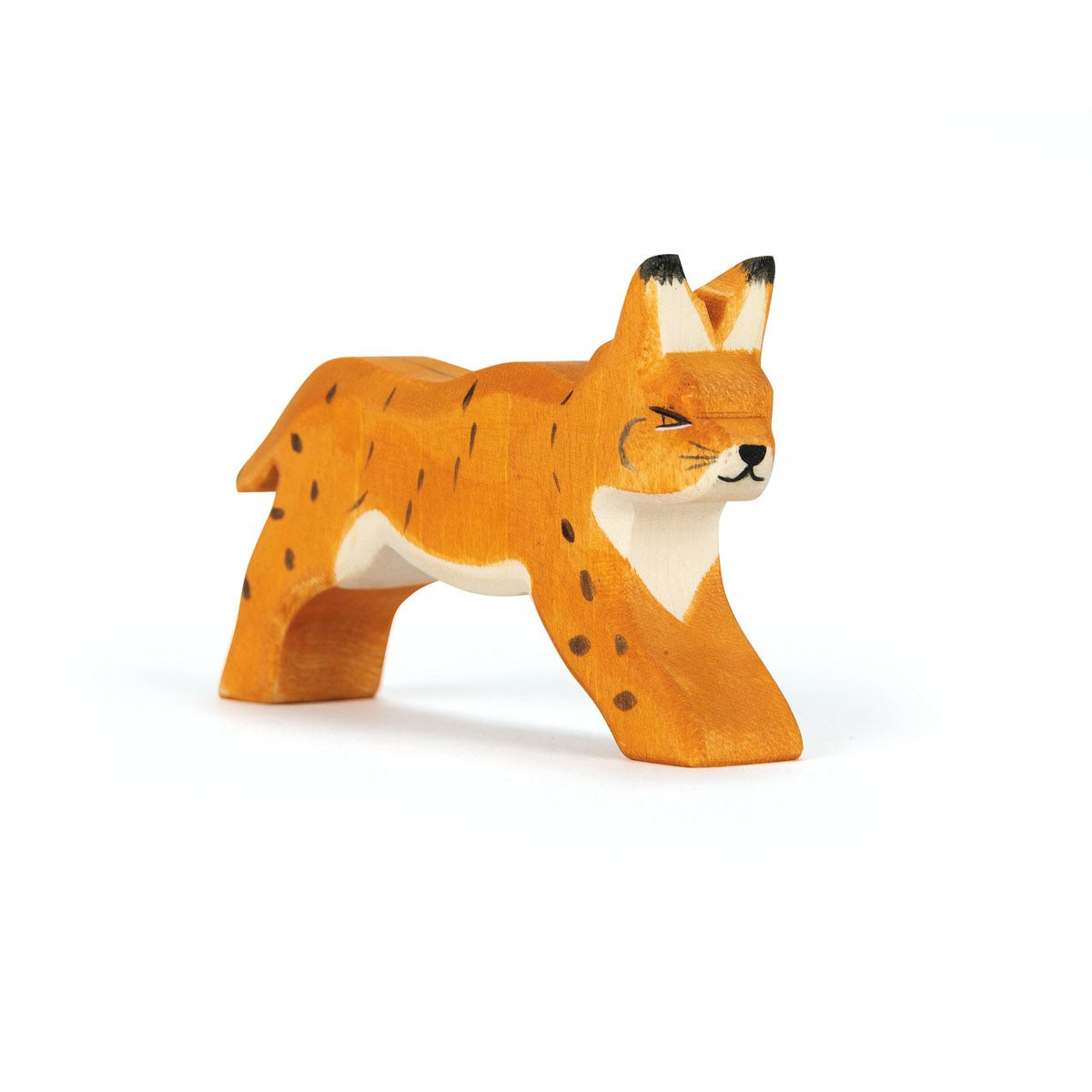 Ostheimer handcrafted wooden running lynx toy, painted in natural colors, ideal for imaginative play and storytelling.