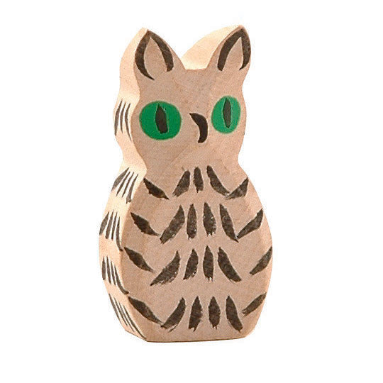 Elegant handcrafted wooden white owl by Ostheimer, featuring dense plumage and sharp features, perfect for imaginative play and storytelling.