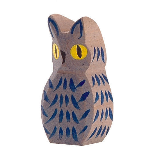 Mystical handcrafted wooden dark owl by Ostheimer with shimmering plumage and glowing round eyes, perfect for imaginative play and storytelling