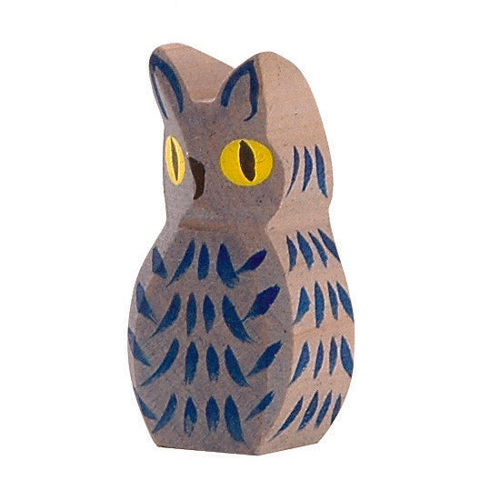Mystical handcrafted wooden dark owl by Ostheimer with shimmering plumage and glowing round eyes, perfect for imaginative play and storytelling