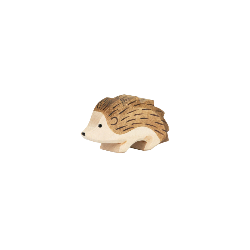 Ostheimer Baby Hedgehog wooden figure with small rounded body and textured spines, handcrafted and hand-painted in Germany