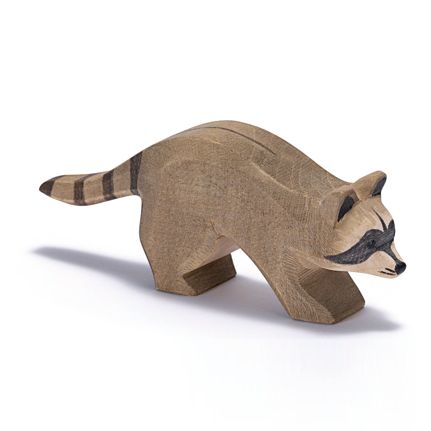 Charming handcrafted wooden raccoon by Ostheimer, ideal for imaginative play and forest-themed storytelling