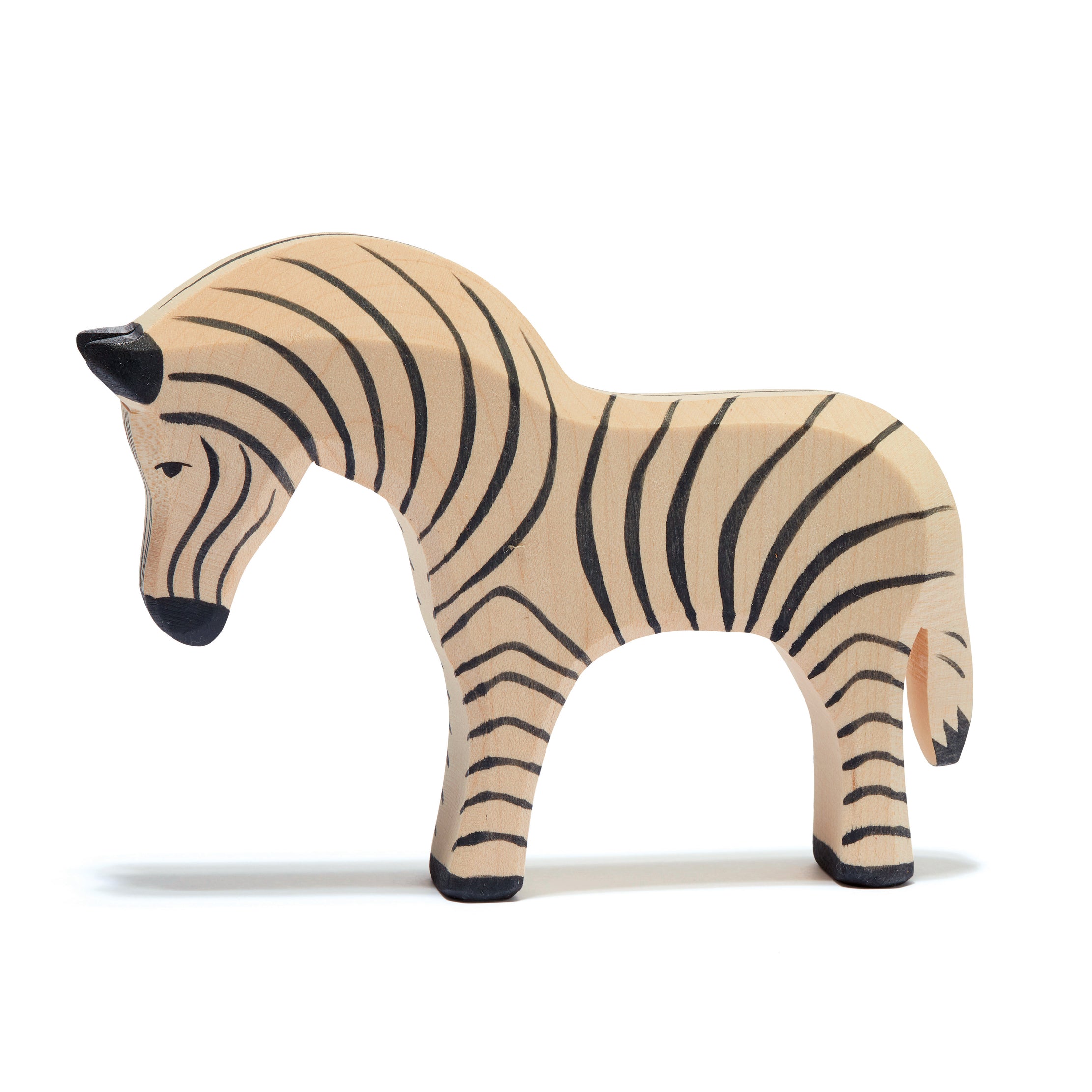 Ostheimer handcrafted wooden zebra figure with detailed striped pattern, perfect for wildlife storytelling and imaginative play. Sustainably made with non-toxic paints.