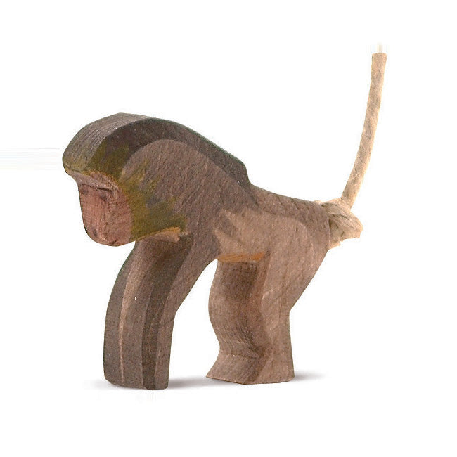 Playful handcrafted wooden baboon by Ostheimer, ideal for wildlife-themed imaginative play and storytelling