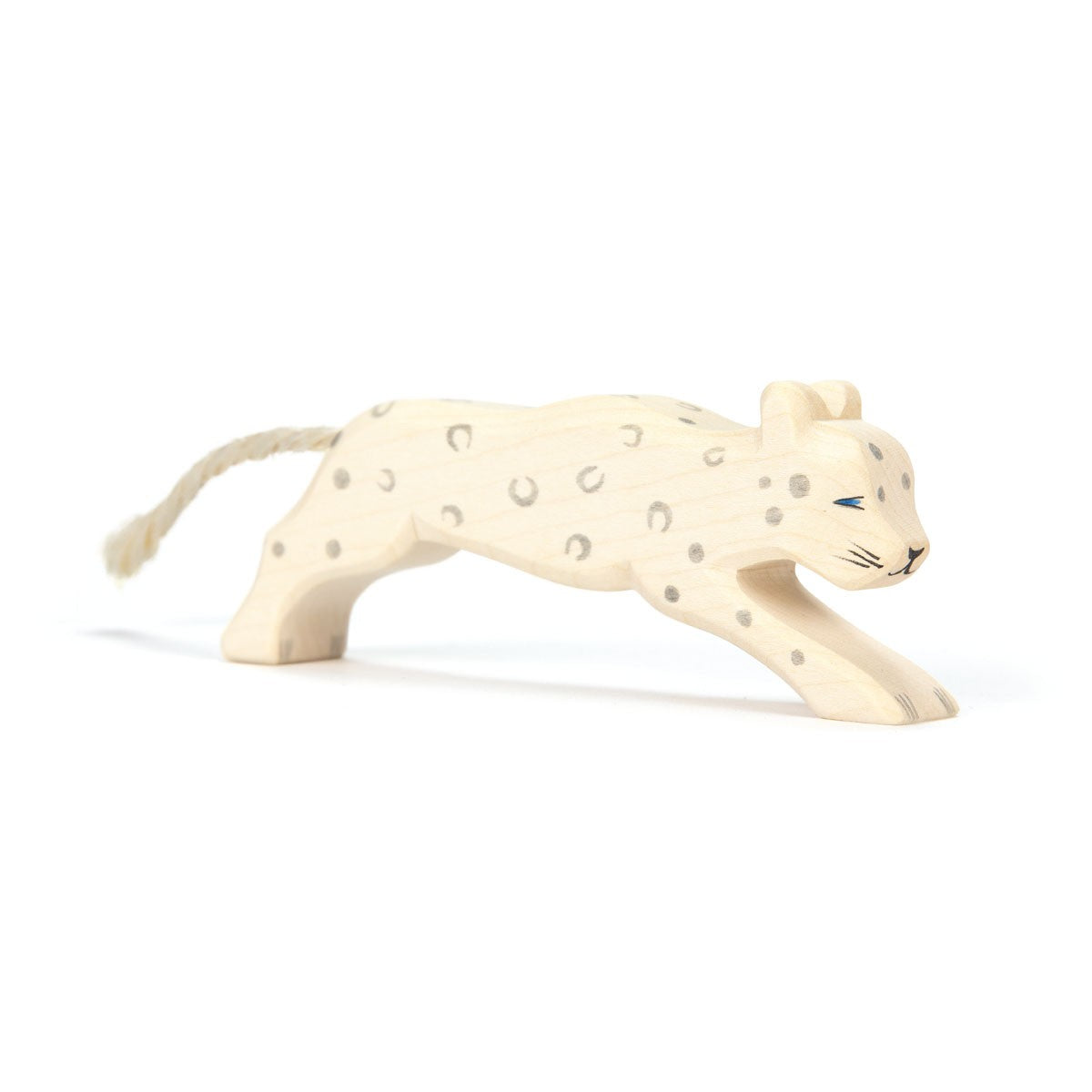 Ostheimer handcrafted wooden snow leopard figure, featuring a detailed spotted coat and elegant posture. Sustainably made with non-toxic paints, ideal for imaginative play.