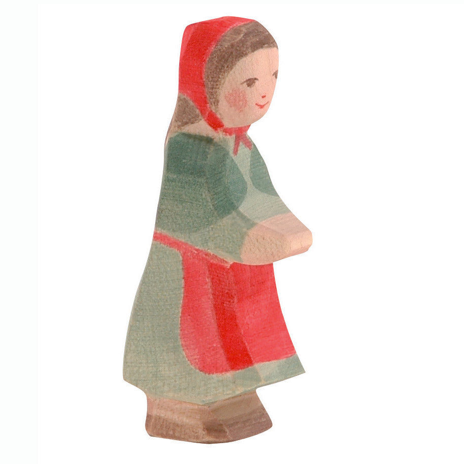 Handcrafted wooden figures by Ostheimer depicting Little Red Riding Hood with a basket and the wolf in a forest scene. Sustainably made with non-toxic paints.