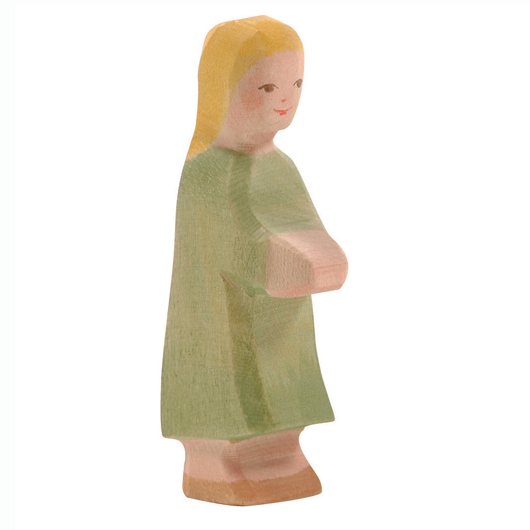 Handcrafted wooden Gretel figure by Ostheimer, inspired by the fairy tale 'Hansel and Gretel,' perfect for storytelling and imaginative play