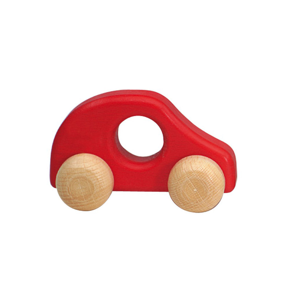 Red wooden toy car for toddlers – handcrafted from solid beech wood for safe, open-ended play.