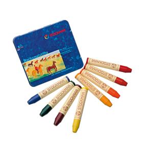 8 Stockmar beeswax stick crayons in the bright colors of the rainbow.
