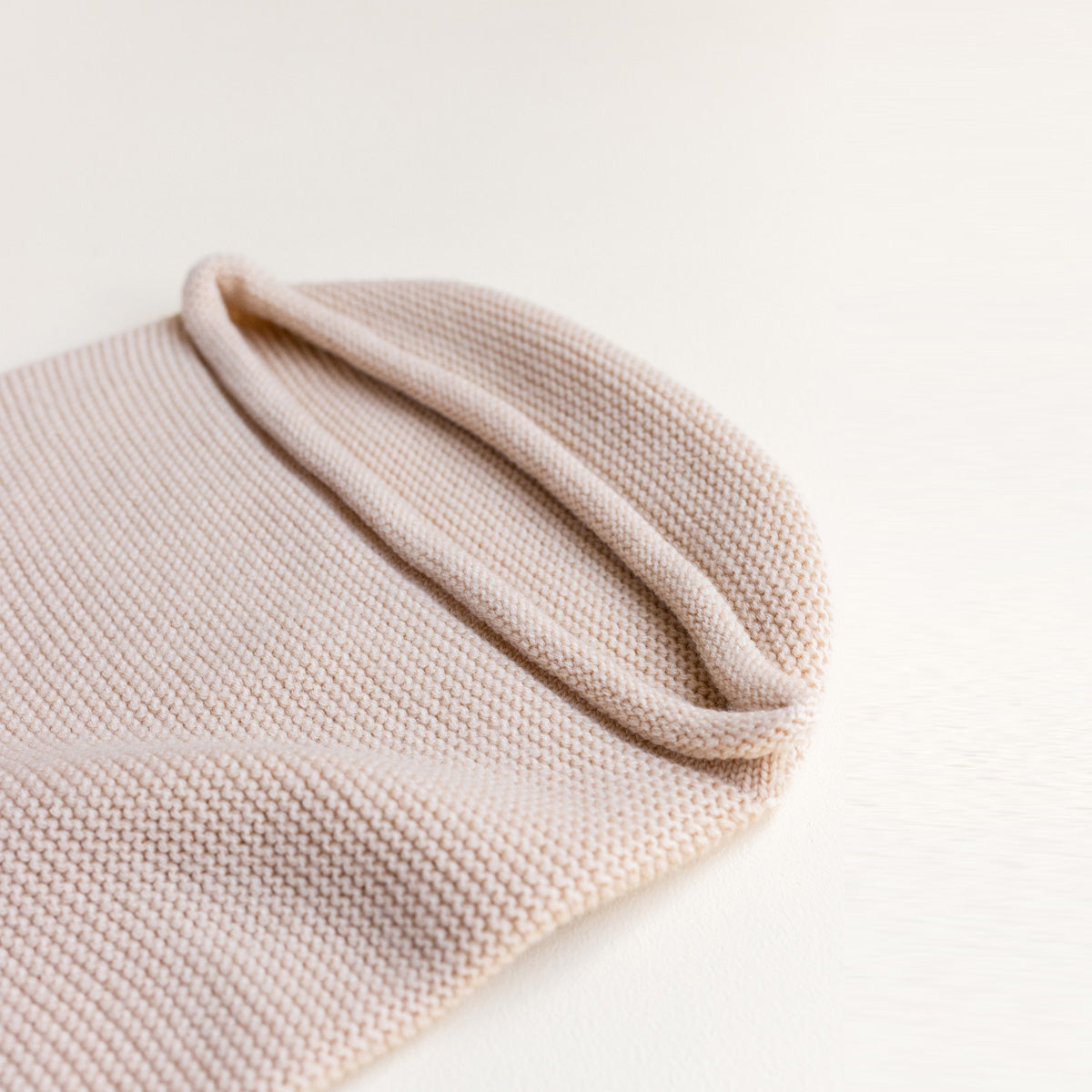 HVID Knitted Baby Cocoon made of 100% extra fine merino wool in neutral tones