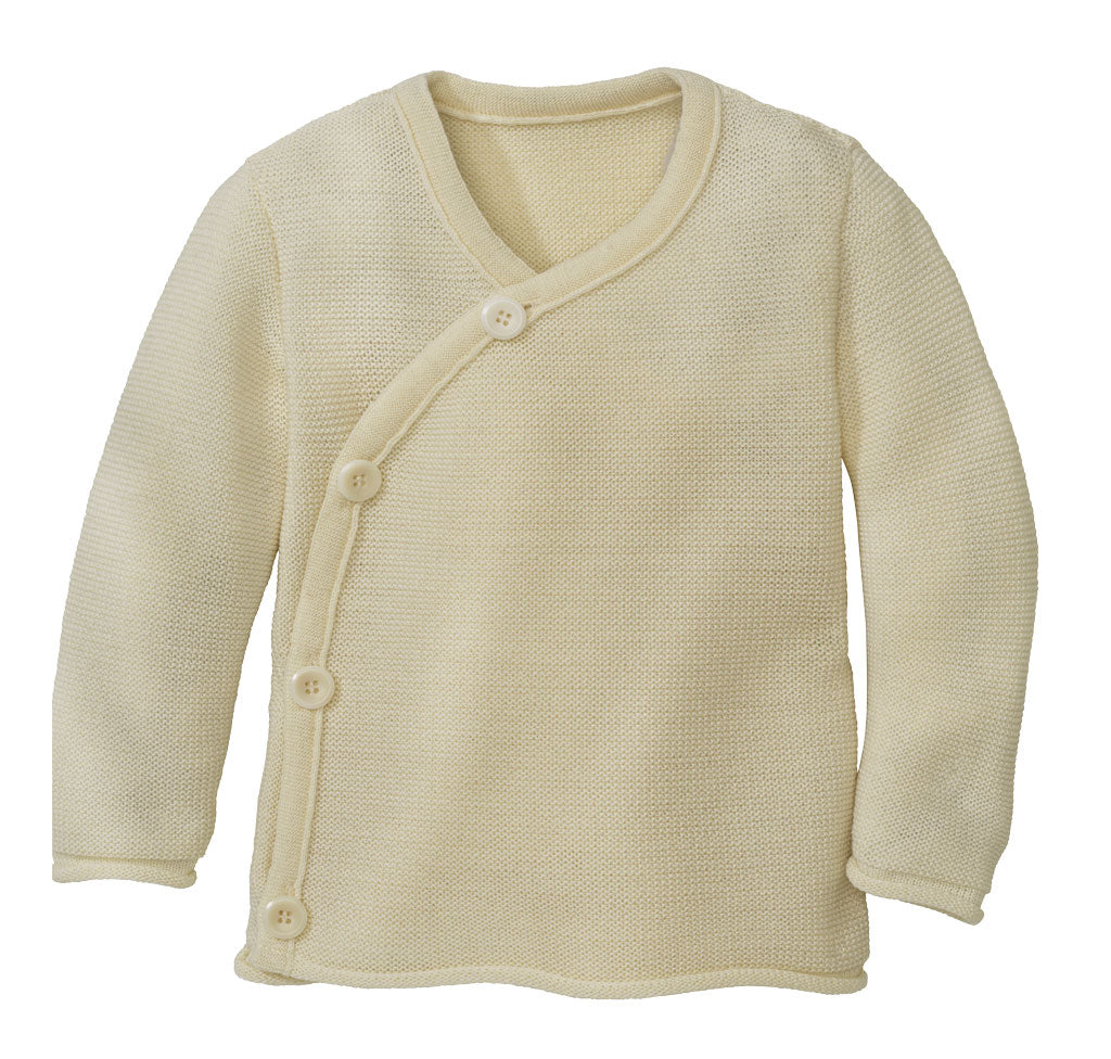 Soft organic merino wool wrap baby cardigan by Disana in color natural – knit baby jacket with button closure, made in Germany.