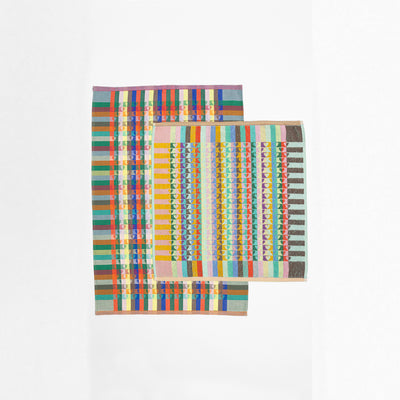 Foekje Fleur Odds & Ends kitchen textile set with 1 tea towel and 1 kitchen towel, made from leftover dyed yarns, sustainable cotton towels with vibrant multicolor design, eco-friendly home textiles made in Portugal