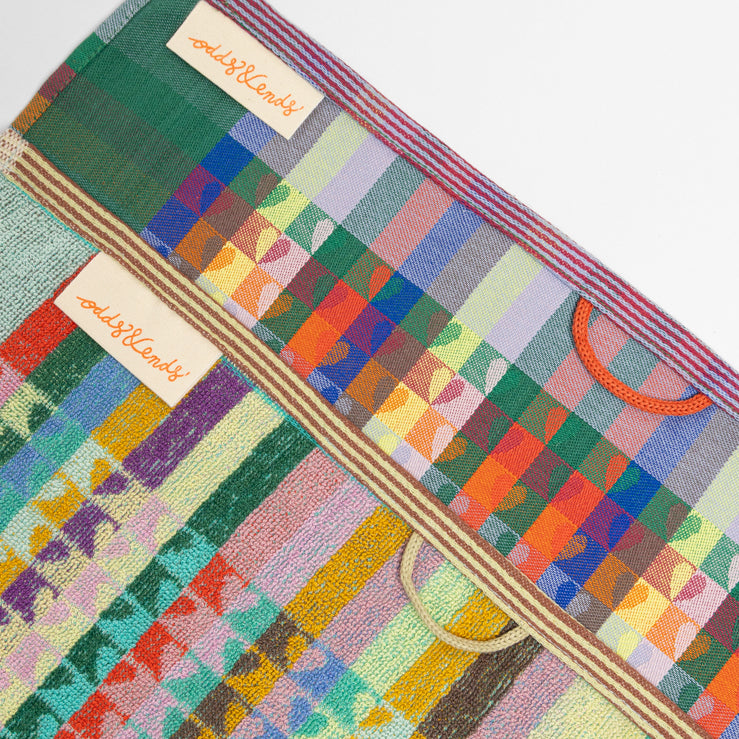 Foekje Fleur Odds & Ends kitchen textile set with 1 tea towel and 1 kitchen towel, made from leftover dyed yarns, sustainable cotton towels with vibrant multicolor design, eco-friendly home textiles made in Portugal