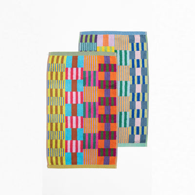 Set of two colorful Foekje Fleur guest towels #75 Tulip Quilt, made in Portugal from 100% cotton industry leftovers with soft velour finish.