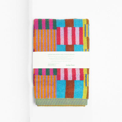 Set of two colorful Foekje Fleur guest towels #75 Tulip Quilt, made in Portugal from 100% cotton industry leftovers with soft velour finish.