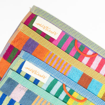 Set of two colorful Foekje Fleur guest towels #75 Tulip Quilt, made in Portugal from 100% cotton industry leftovers with soft velour finish.