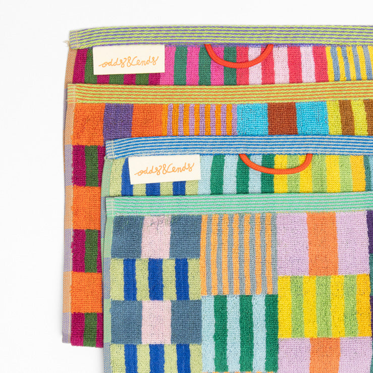 Set of two colorful Foekje Fleur guest towels #75 Tulip Quilt, made in Portugal from 100% cotton industry leftovers with soft velour finish.