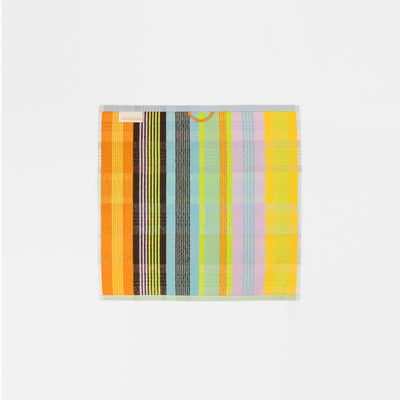 Sustainable kitchen towel in a bold wild weave pattern, 52 wildweave made from deadstock cotton yarns. Features a 50/50 terry and flat weave design, 50 x 50 cm size, and hanging label. Crafted in Portugal by Foekje Fleur.