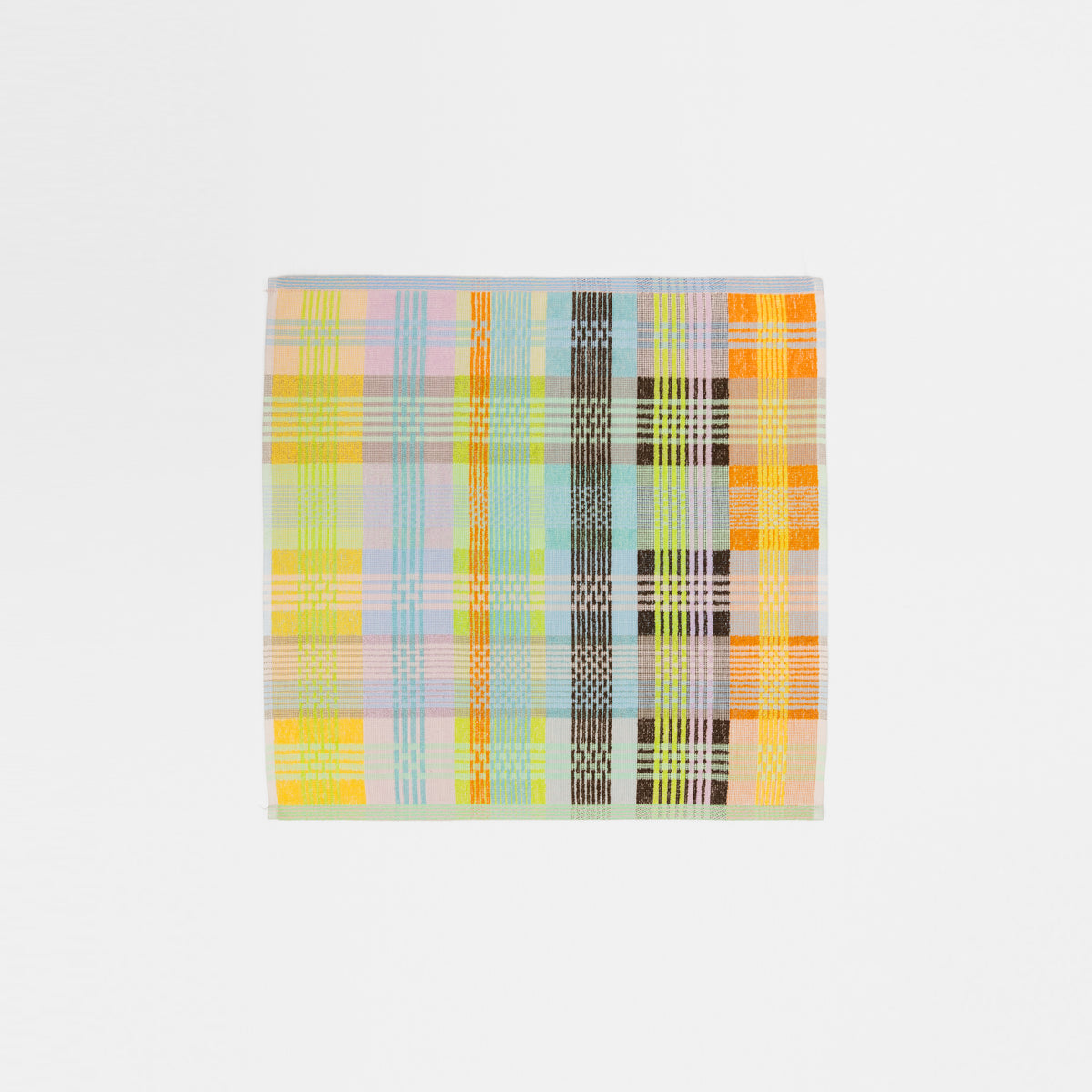 Sustainable kitchen towel in a bold wild weave pattern, 52 wildweave made from deadstock cotton yarns. Features a 50/50 terry and flat weave design, 50 x 50 cm size, and hanging label. Crafted in Portugal by Foekje Fleur.