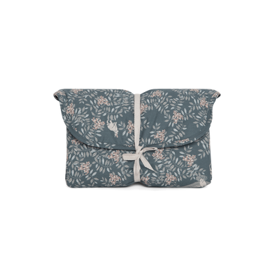 Portable diaper changing mat by Garbo&Friends in Fauna Forest print with soft cotton percale, storage for essentials, and eco-friendly materials.