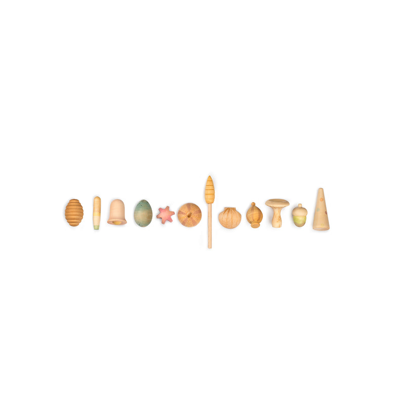 Grapat Wonders set of 12 flora-inspired wooden elements, connecting children with nature’s cycles, ideal for open-ended play and seasonal learning