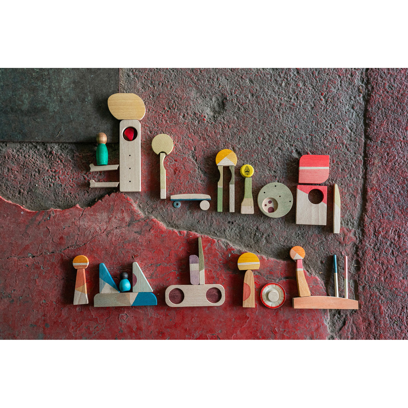 Grapat Happy Place set with 40 colorful wooden pieces, including stairways, railings, and shapes for open-ended building, storytelling, and imaginative play.