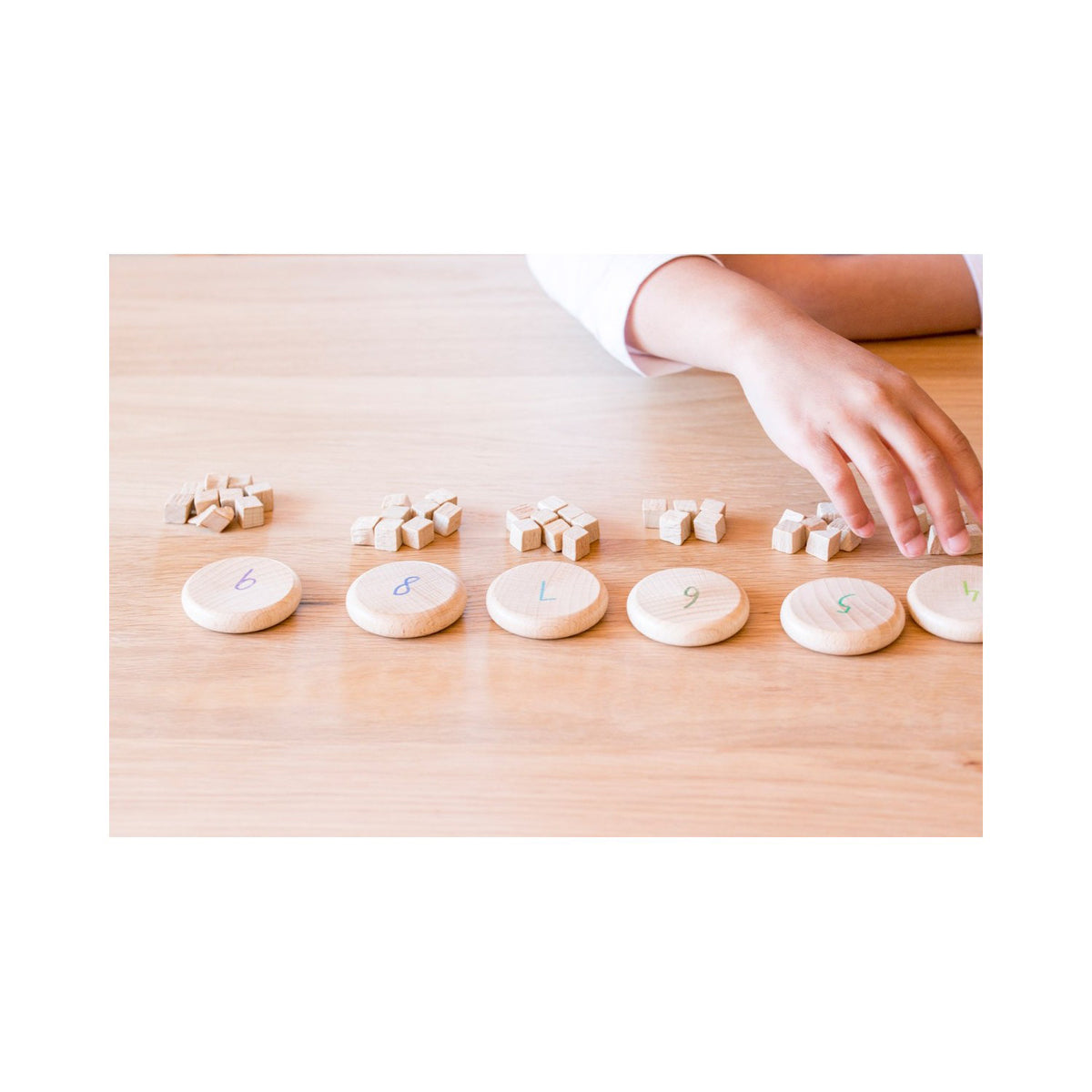 Grapat Coins to Count set with 60 numbered wooden coins in rainbow colours
