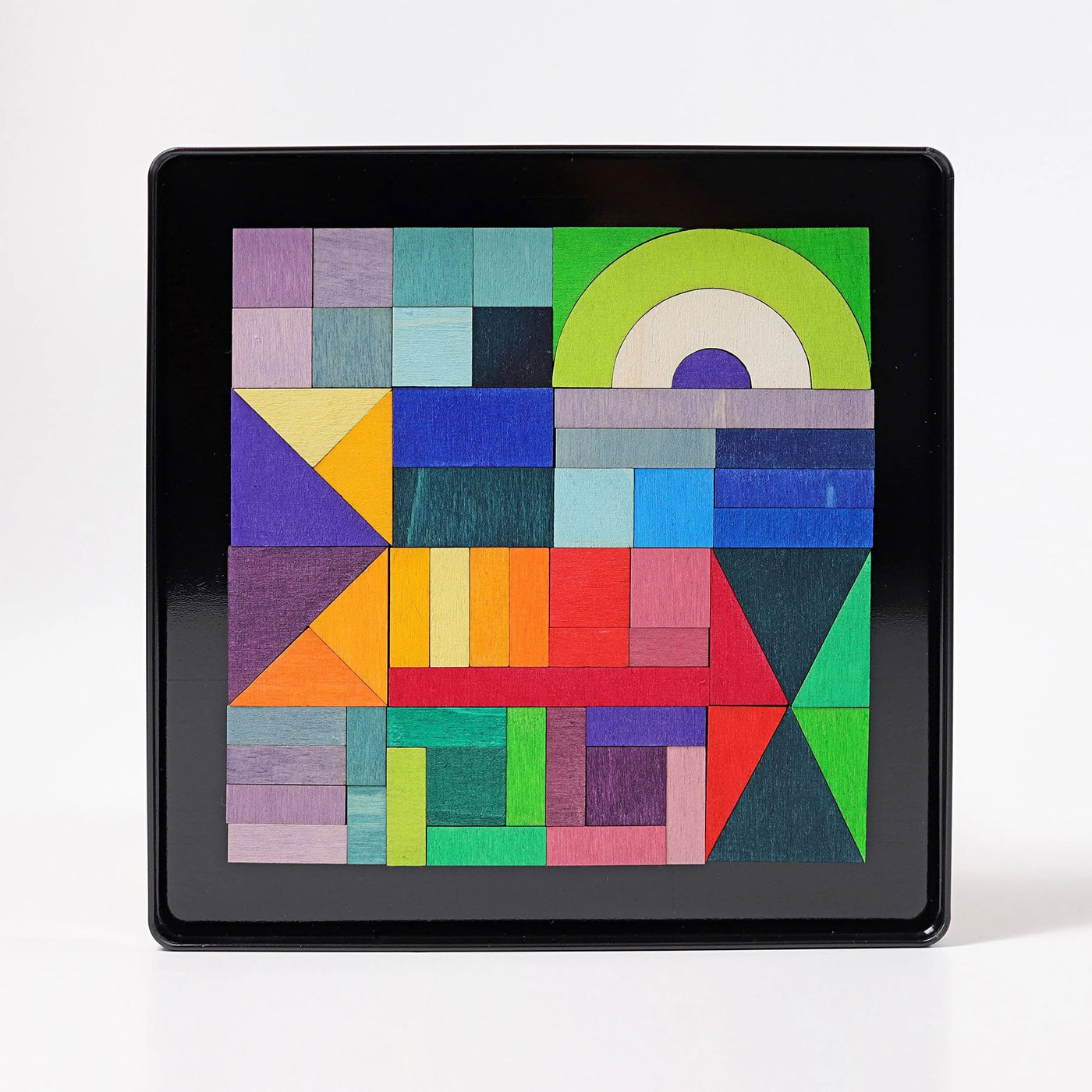 Grimms Magnetic Puzzle Graphic Shapes – 59 colorful wooden magnetic pieces in metal box, perfect for creative pattern design and play