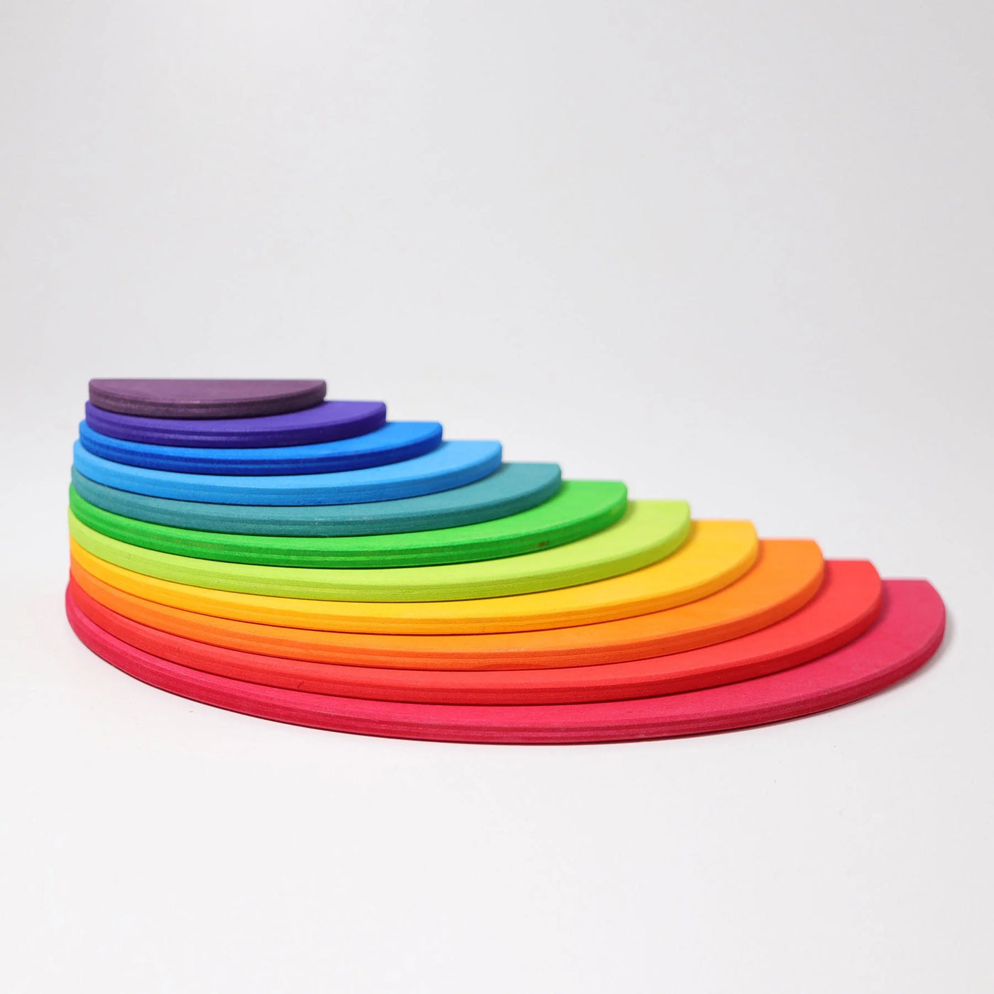 Grimms Rainbow Semicircles – colorful wooden building set with 11 birch plywood pieces, ideal for imaginative construction and open-ended play