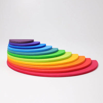 Grimms Rainbow Semicircles – colorful wooden building set with 11 birch plywood pieces, ideal for imaginative construction and open-ended play