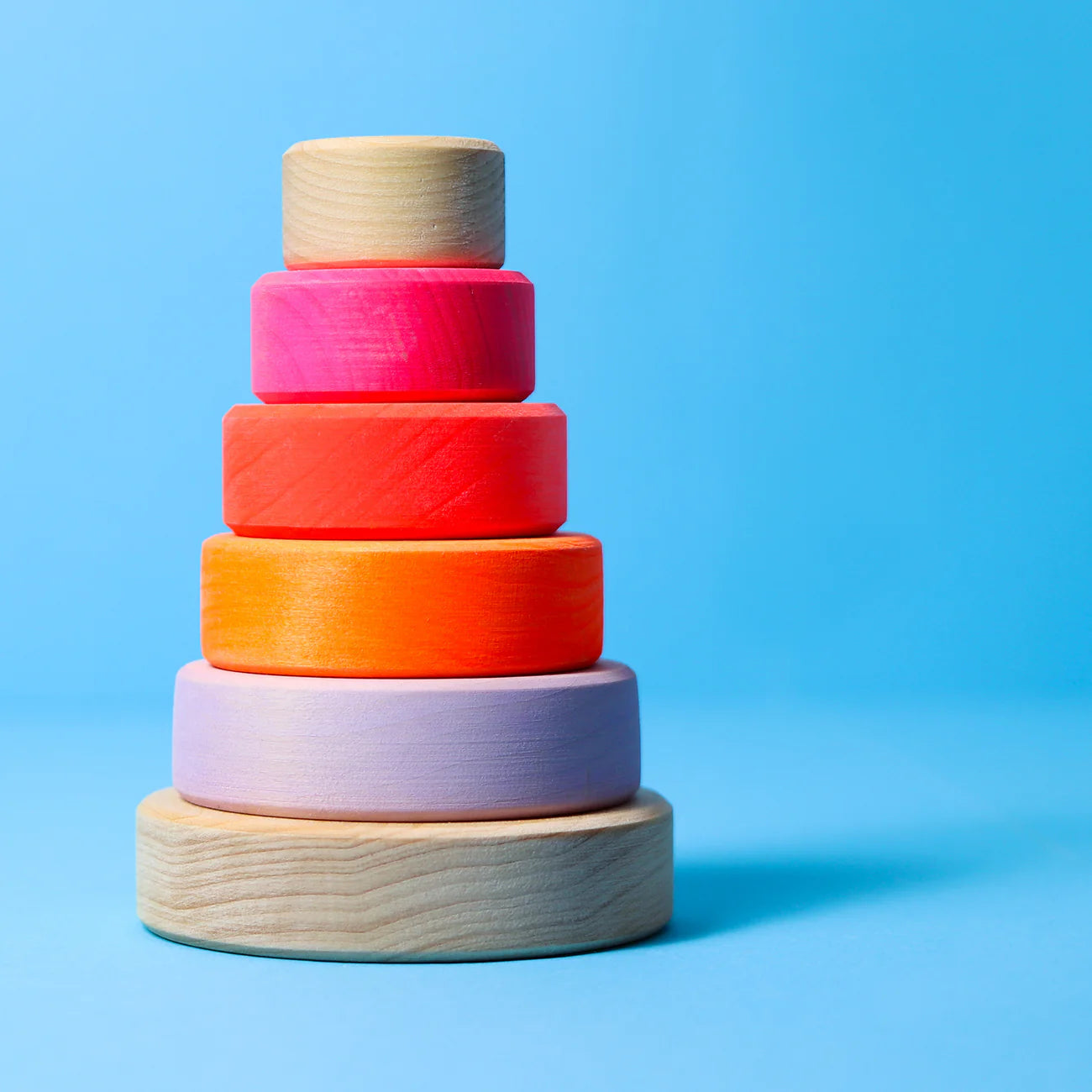 Grimms Small Conical Tower Neon Pink – colorful wooden stacking toy with 5 discs, handcrafted from linden wood, promotes fine motor skills