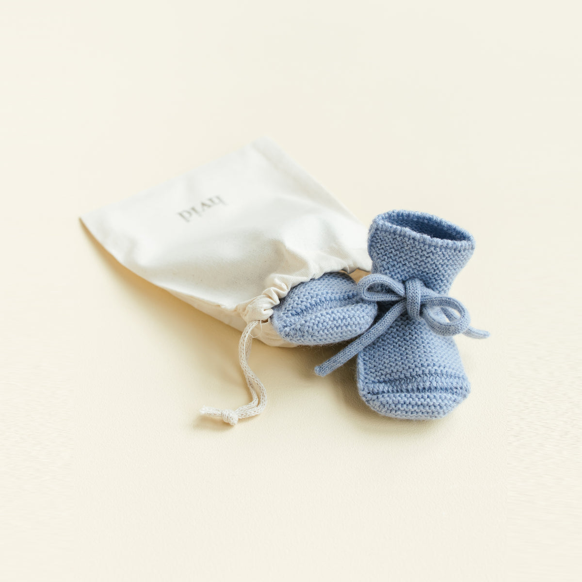HVID Knitted Baby Booties made of extra fine Italian merino wool in a charming cotton bag