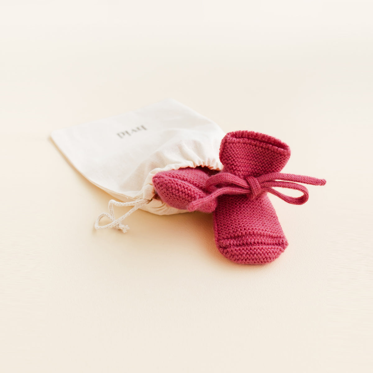 HVID Knitted Baby Booties made of extra fine Italian merino wool in a charming cotton bag