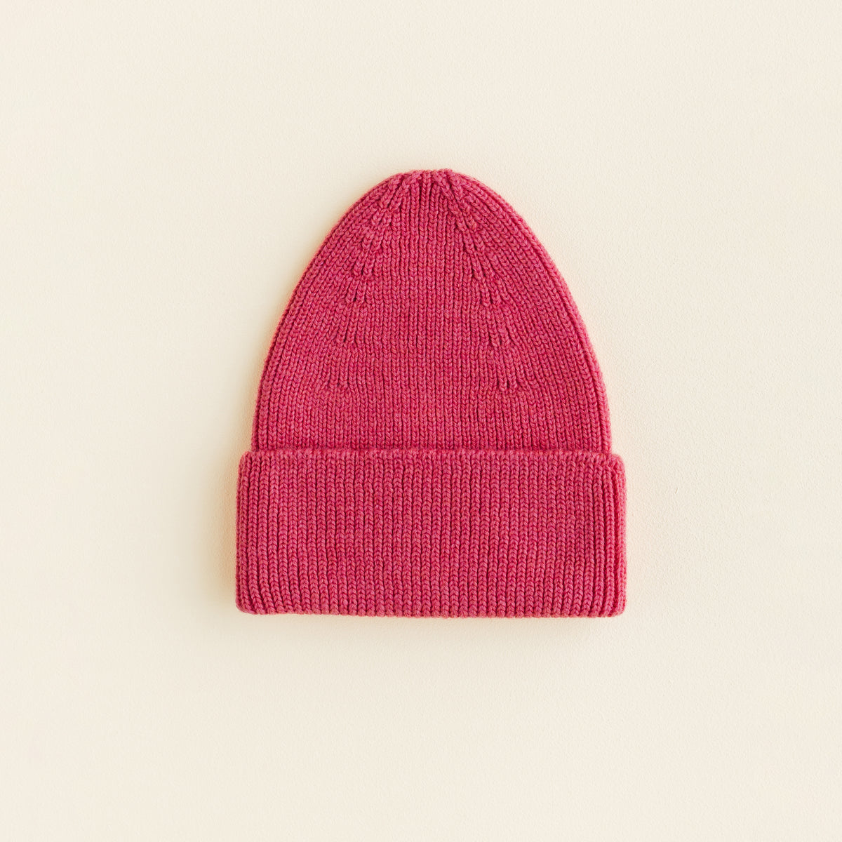 Hvid rib beanie in bubblegum pink, soft merino wool baby and toddler hat made in Belgium, breathable and gentle for sensitive skin.
