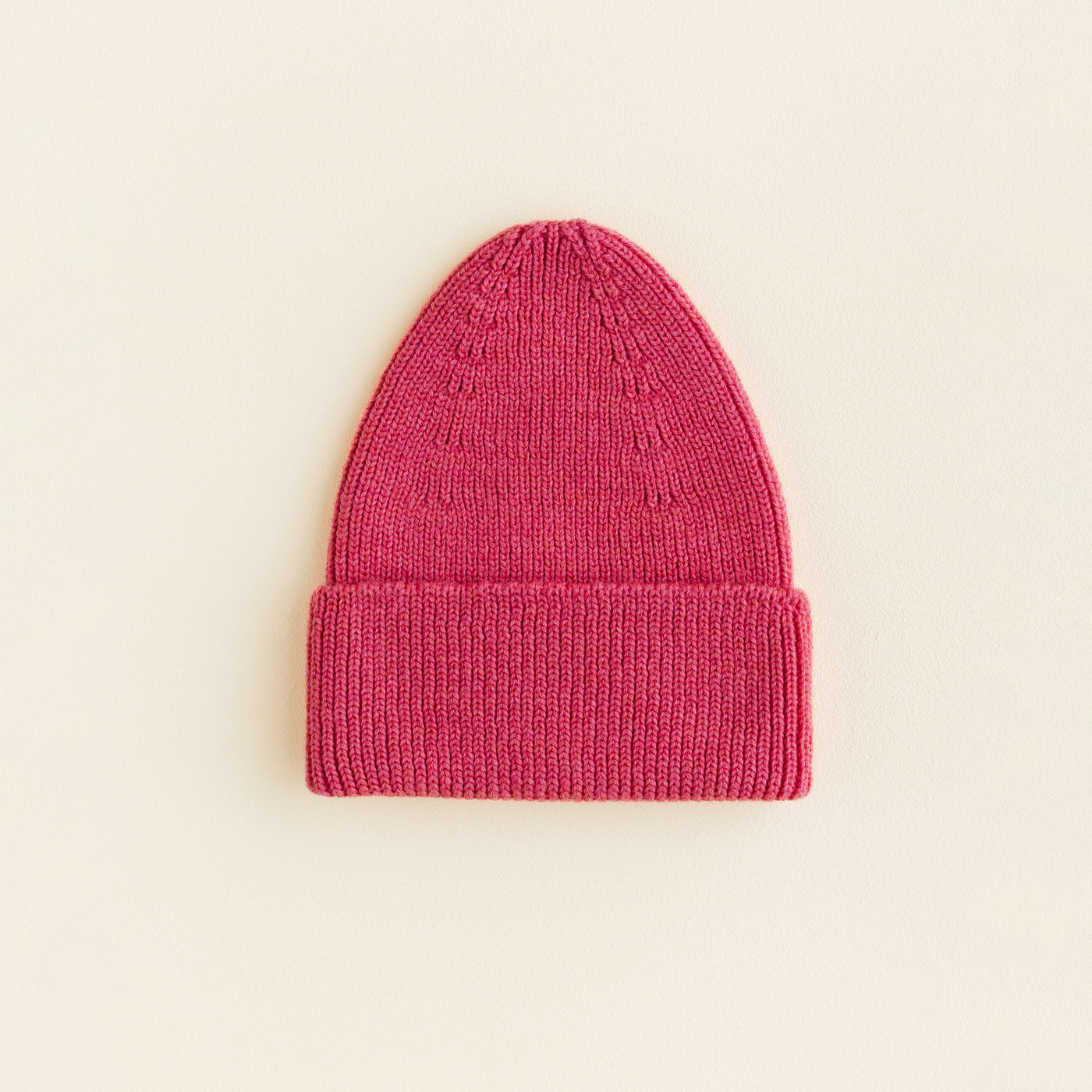 Hvid rib beanie in bubblegum pink, soft merino wool baby and toddler hat made in Belgium, breathable and gentle for sensitive skin.