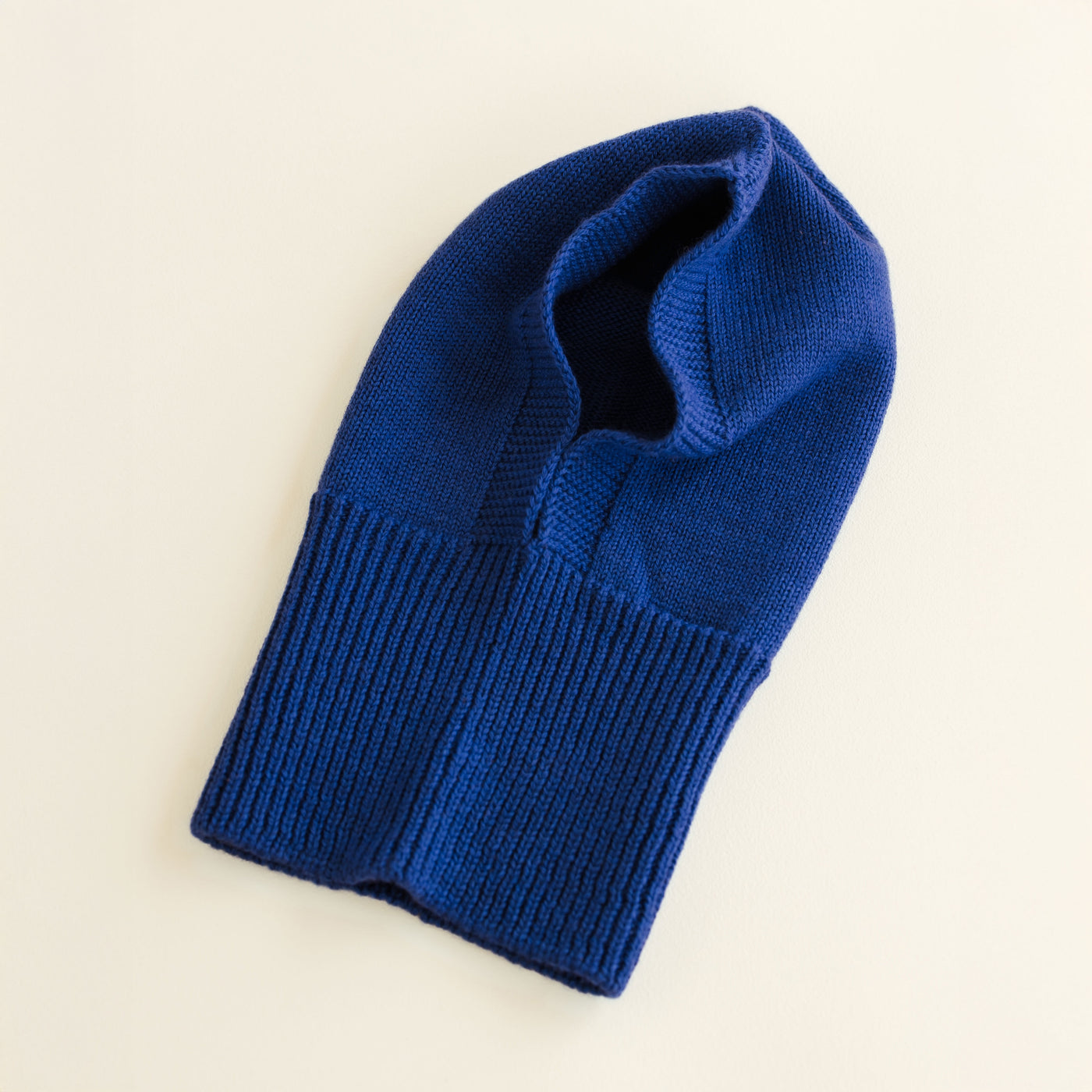 Cobalt blue seamless merino wool balaclava by Hvid, with ribbed neck and soft texture, made in Belgium