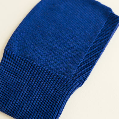 Cobalt blue seamless merino wool balaclava by Hvid, with ribbed neck and soft texture, made in Belgium.