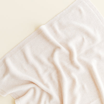 Hvid Felix Blanket in Cream – soft rib-knit merino wool baby blanket made in Belgium.