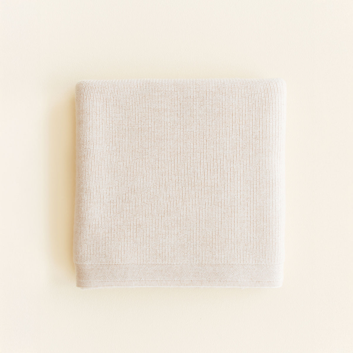 Hvid Felix Blanket in Cream – soft rib-knit merino wool baby blanket made in Belgium.