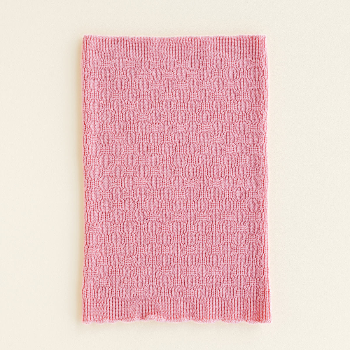 Hvid Tube Scarf Gigi in cotton candy – soft merino wool tube scarf for babies and children, knitted in Belgium to keep little ones warm and comfortable.