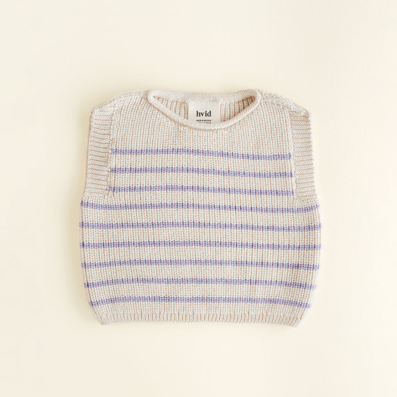 Hvid Vest Harvey in cream lila stripe, a seamless baby vest made from extra fine merino wool with a soft fisherman’s rib and elastic neckline, knitted in Belgium.