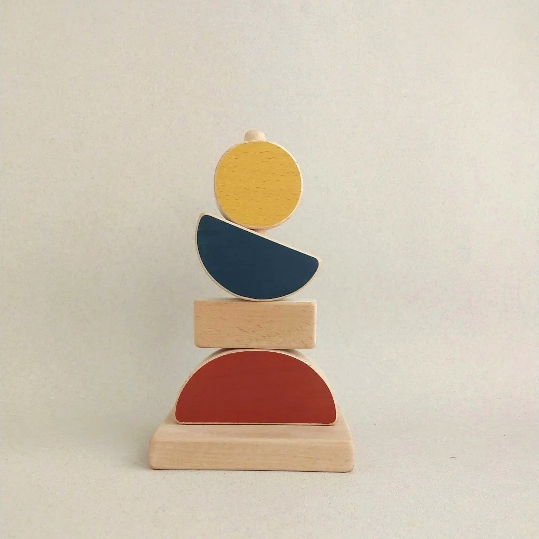 Landscape Stacking Toy handcrafted from FSC-certified beech wood with non-toxic paints. Earthy tones and geometric shapes inspire creative play and fine motor skills.