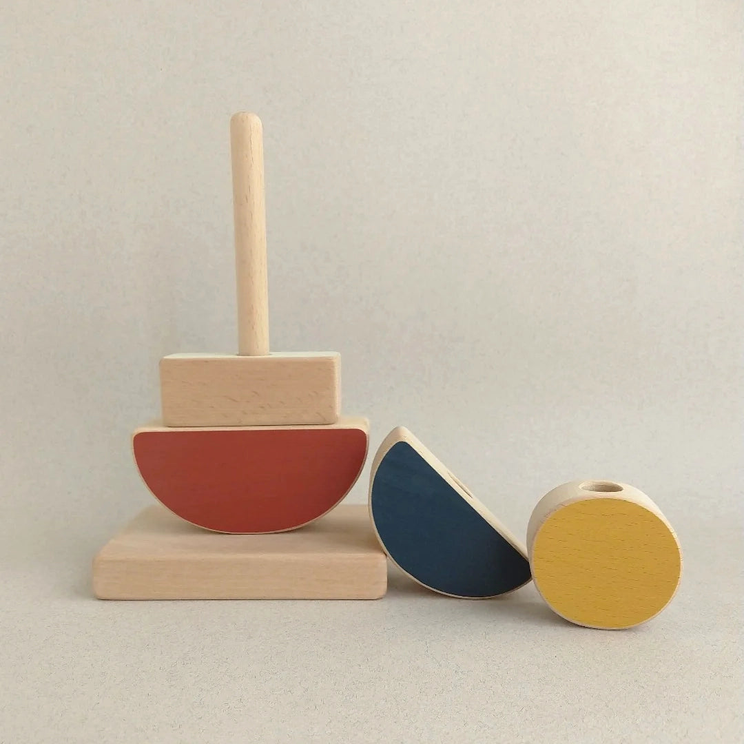 Landscape Stacking Toy handcrafted from FSC-certified beech wood with non-toxic paints. Earthy tones and geometric shapes inspire creative play and fine motor skills.