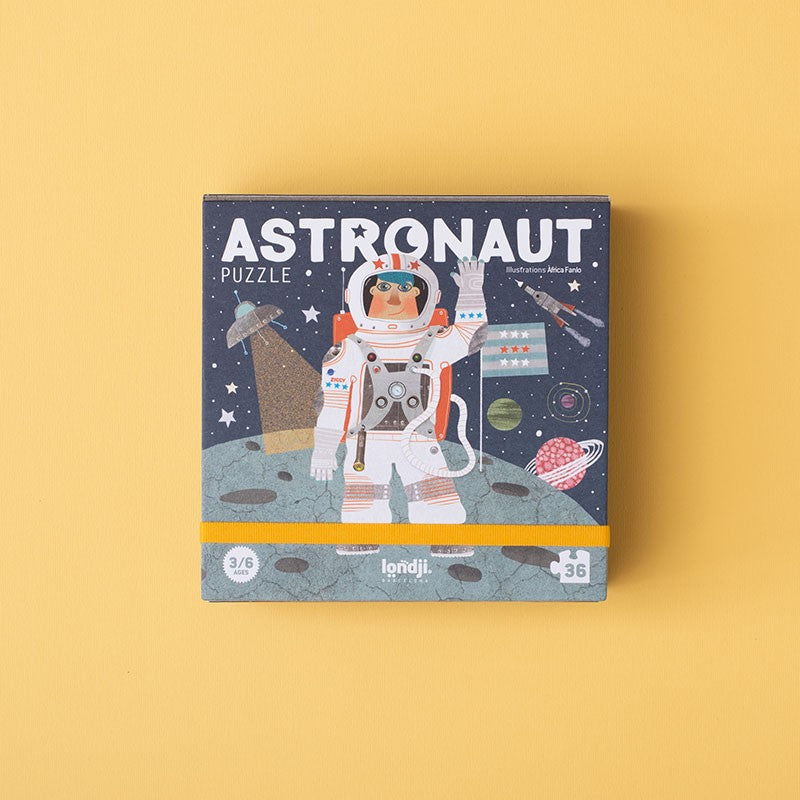 Astronaut Puzzle for kids, 36-piece space-themed jigsaw with astronaut, planets, and spaceships, compact size with cotton storage bag.