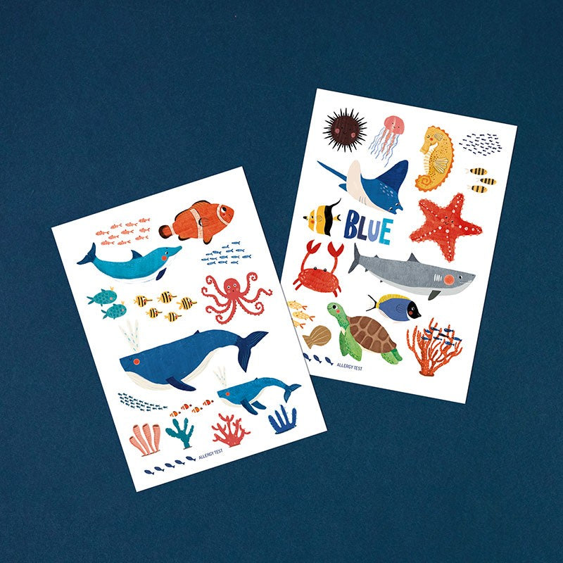 Londji Blue Ocean Tattoos Set – children’s temporary tattoos with whales, dolphins and sea animals, safe and non-toxic, made in Barcelona, illustrated by Txell Darné.