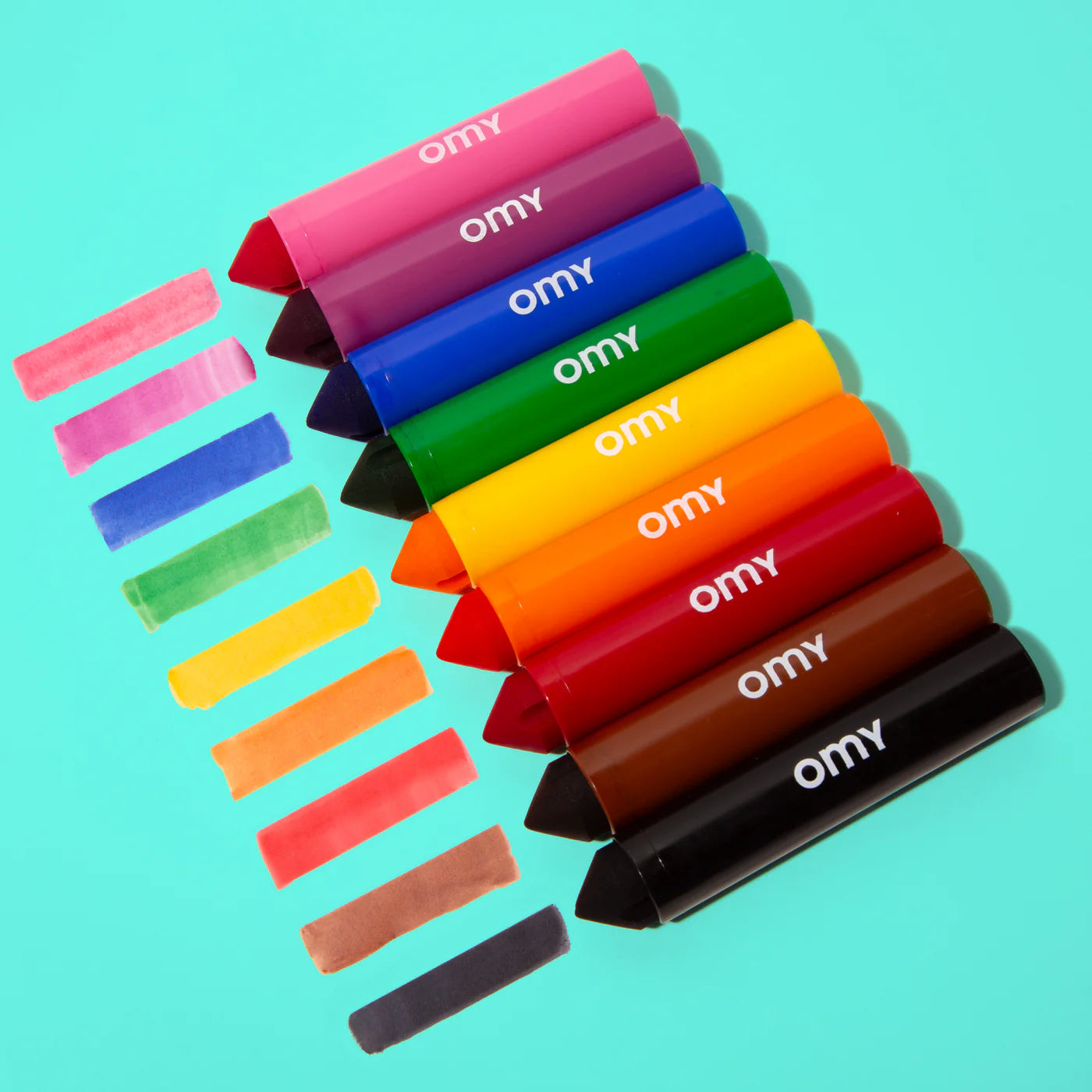 Nine brightly colored, ultra-washable maxi markers with giant conical tips in a box that doubles as a pencil holder.