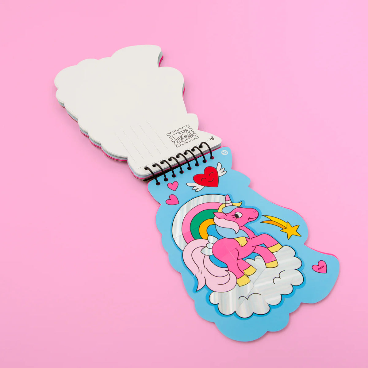 A colorful OMY activity book with neon, gold, and holographic stickers, designed to inspire creativity in children aged 4 and up. Perfect for imaginative play and easy to carry anywhere.